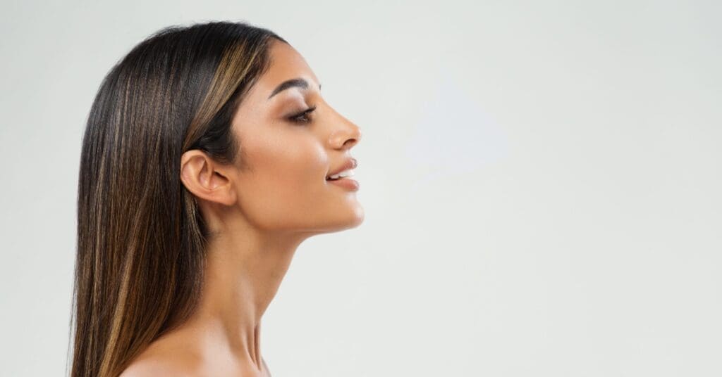Side View Of A Young Womans Face And Nose